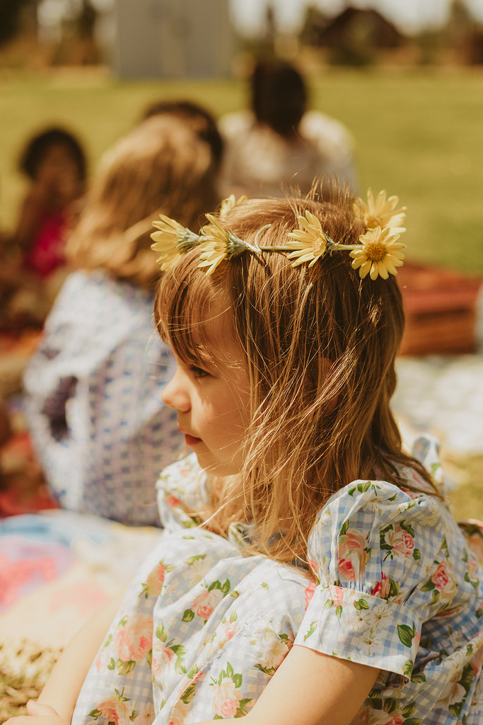 Girl in vintage dress and flower crown